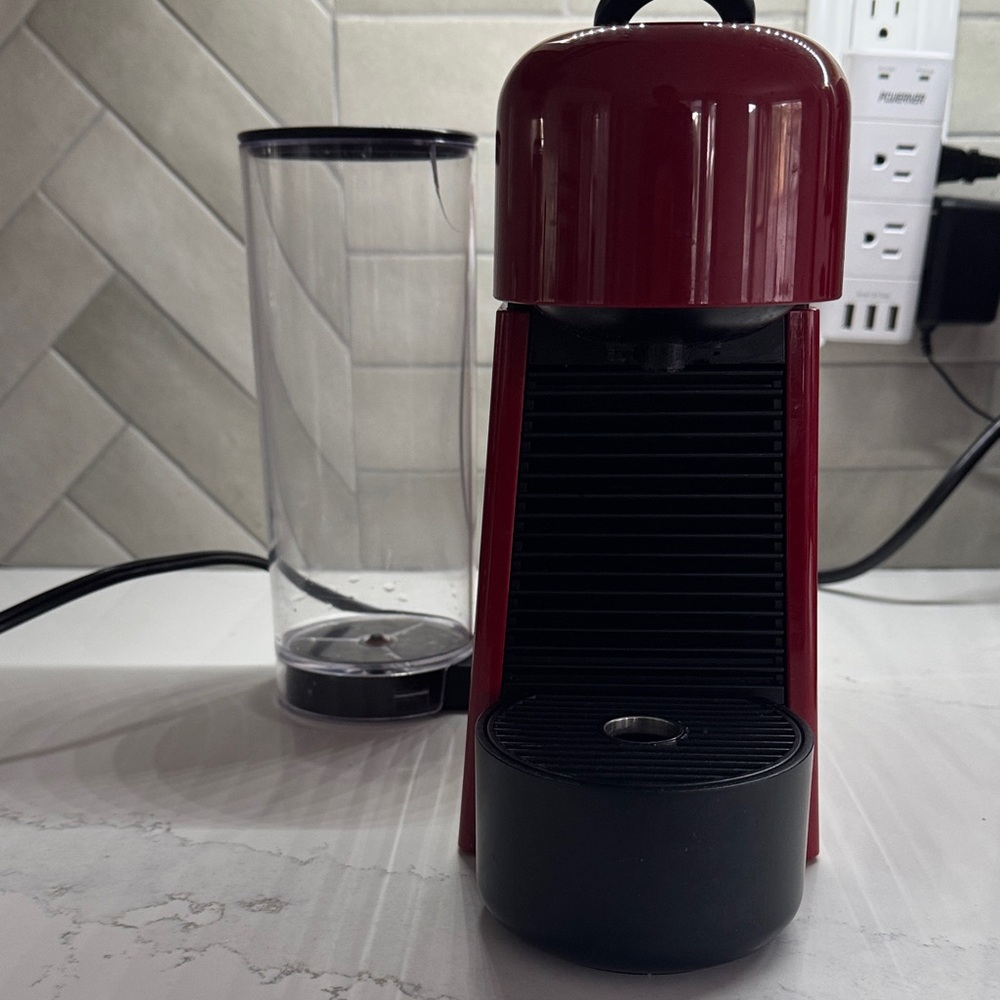 Nespresso Red and Black Coffee Machine